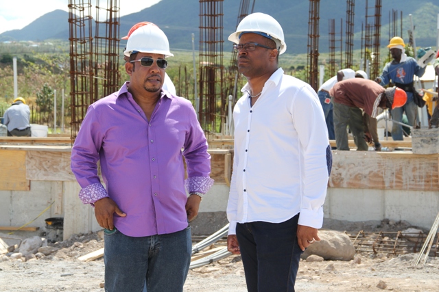 (L-R) Managing Director of the Residence at Tamarind Cove and Marina Project and local investor Greg Hardtman and Deputy Premier of Nevis and Minister of Tourism Hon. Mark Brantley touring the project site on March 04, 2014